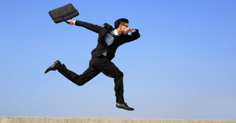 Business man running with brief case