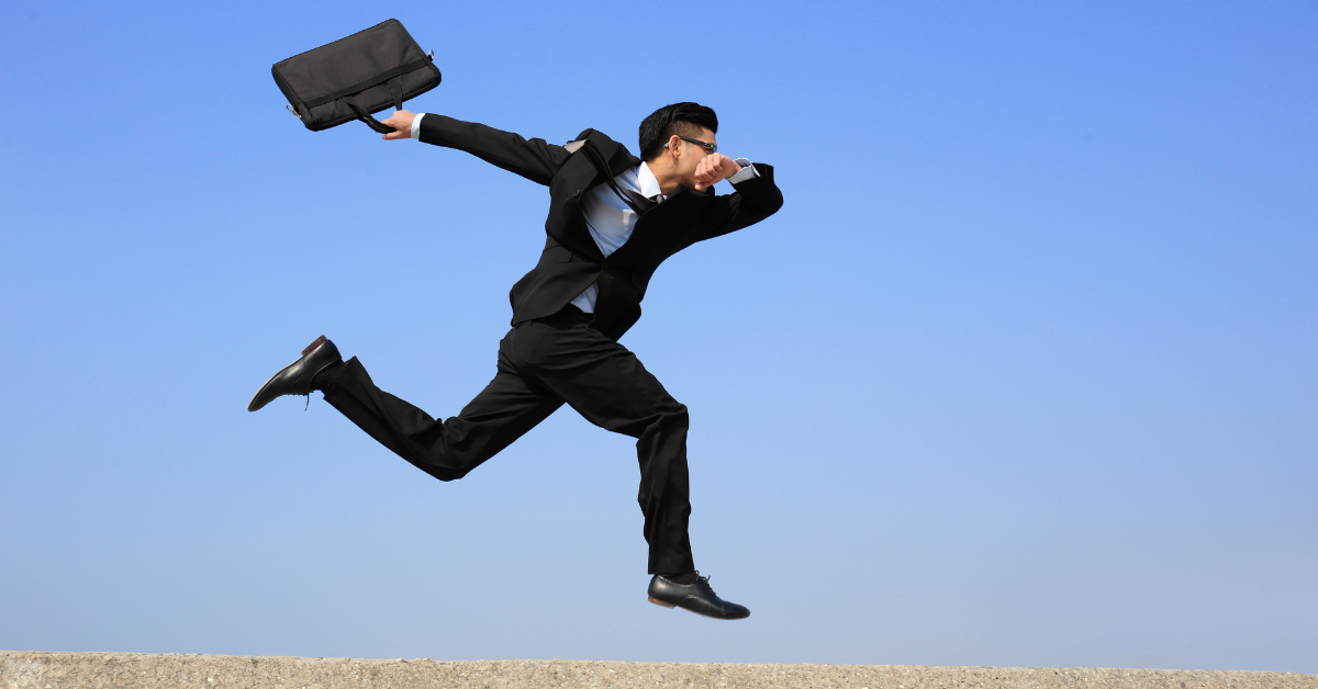Business man running with brief case